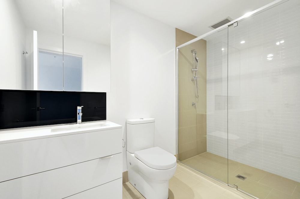A modern bathroom with a glass shower